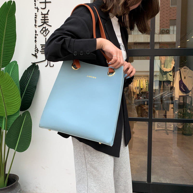 Korean version of the textured official document tote handbags